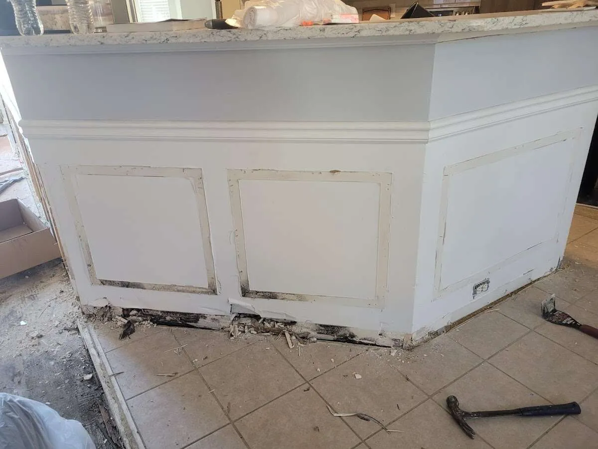 Water damage and mold on kitchen during Storm Damage Restoration in Vero Beach South